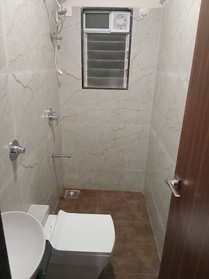 Bathroom in 1.5 BHK Apartment at Makarand CHS, Ghatkopar East – for Rent