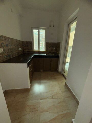 Kitchen in 3 BHK Apartment at Mahagun Mahagunpuram, Shastri Nagar – for Sale