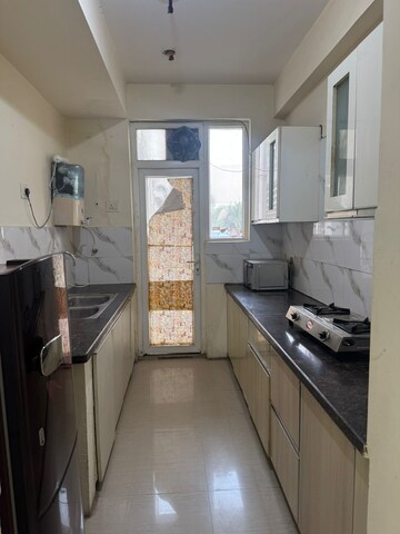 Kitchen in 2 BHK Apartment at NK Sharma Savitry Greens, Lohgarh – for Rent