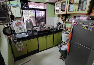 Kitchen in 1 BHK Apartment at Bhumiraj Woods, Kharghar Sector 20 – for Sale