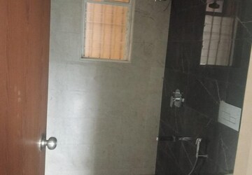 Bathroom in 2 BHK Apartment at Dosti West County, Balkum Pada – for Rent
