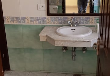 Bathroom in 3 BHK Apartment at Sandwoods Spangle Heights, Dhakoli – for Rent