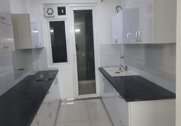 Kitchen in 3 BHK Apartment at Sandwoods Spangle Heights, Dhakoli – for Rent