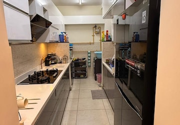 Kitchen in 2 BHK Apartment at Prestige Song Of The South, Yelenahalli – for Sale
