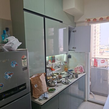 Kitchen in 2.5 BHK Apartment at Signature The Millennia 2, Garoli Kalan – for Sale