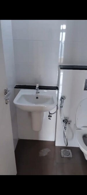 Bathroom in 3 BHK Apartment at Rustomjee Azziano Wing E, Thane West – for Rent