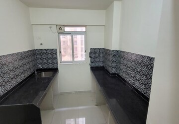 Kitchen in 1 BHK Apartment at Lodha Amara, Kolshet Road – for Rent