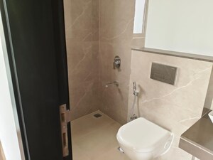 Bathroom in 1 BHK Apartment at Piramal Revanta, Mulund West – for Rent