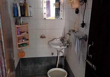 Bathroom in 2 BHK Apartment at Milton Tower, Vip Road – for Sale