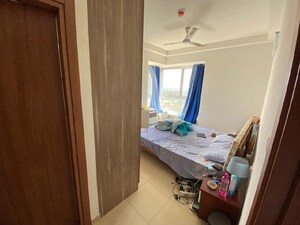 Bedroom in 2 BHK Apartment at Bhartiya Nikoo Homes, Thanisandra Main Road – for Rent