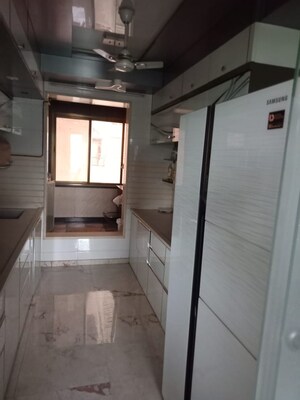 Kitchen in 2.5 BHK Apartment at Neelkanth Greens, Manpada – for Rent