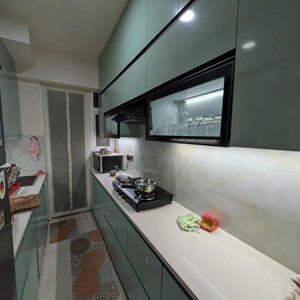 Kitchen in 2 BHK Apartment at Signature The Millennia 2, Garoli Kalan – for Sale