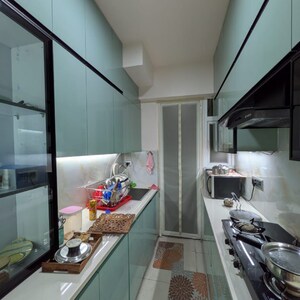 Kitchen in 2 BHK Apartment at Signature The Millennia 2, Garoli Kalan – for Sale