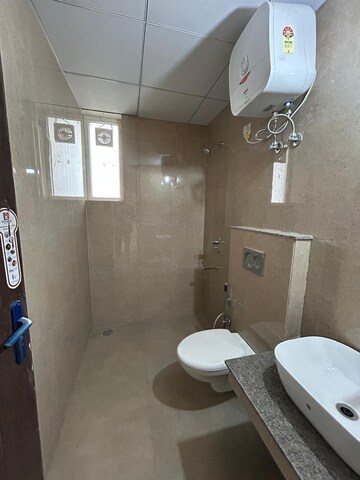 Bathroom in 4 BHK Apartment at Affinity Greens, International Airport Road – for Rent
