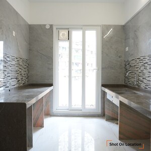 Kitchen in 3 BHK Apartment at Tharwani Vedant Palacia, Khadakpada – for Sale