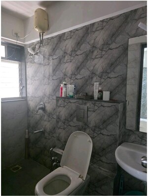Bathroom in 1 BHK Apartment at Wadhwa Elite Solitaire, Kolshet Road – for Sale