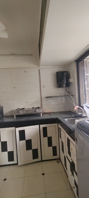 Kitchen in 1 BHK Apartment at Hiranandani Garden Eden 2, Powai – for Rent