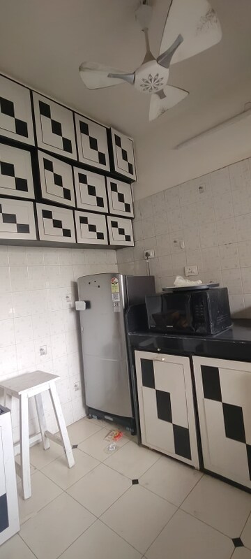 Kitchen in 1 BHK Apartment at Hiranandani Garden Eden 2, Powai – for Rent