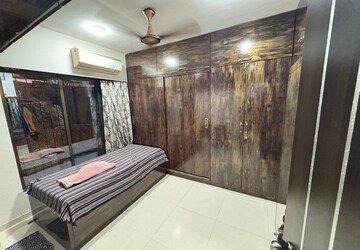Bedroom in 3 BHK Apartment at Evershine Millennium Paradise, Kandivali East – for Rent