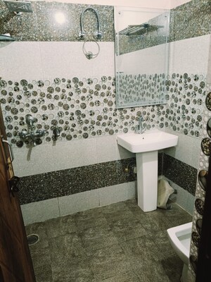 Bathroom in 2 BHK Apartment at Dhakoli – for Rent