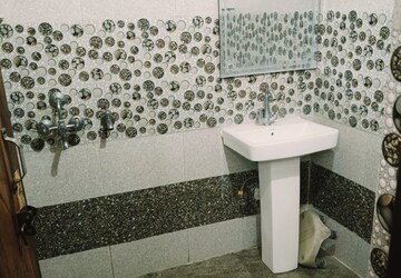 Bathroom in 2 BHK Apartment at Dhakoli – for Rent