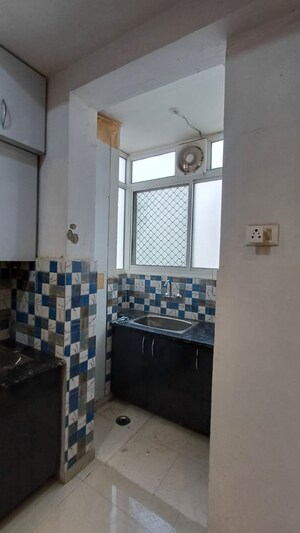 Kitchen in 2.5 BHK Apartment at Prateek Grand City, Siddharth Vihar – for Rent