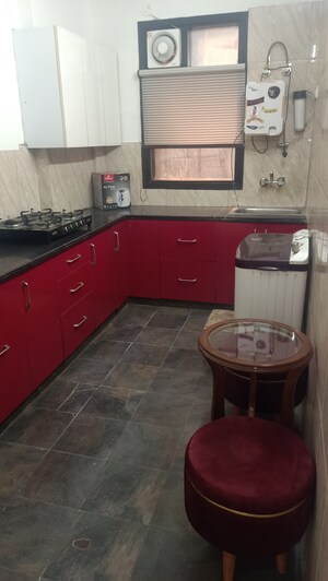 Kitchen in 2 BHK Apartment at Aman Luxury Apartments, Sahastradhara Road – for Rent