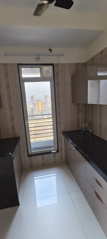 Kitchen in 2 BHK Apartment at Sheth Zuri, Laxmi Nagar – for Rent