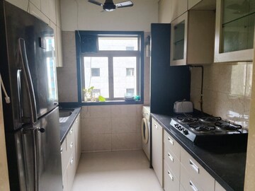 Kitchen in 2 BHK Apartment at Pr Woodwind, Andheri East – for Rent
