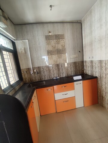 Kitchen in 1.5 BHK Apartment at Parshwanath Galaxy, Ghodbunder Road – for Rent