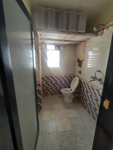 Bathroom in 1.5 BHK Apartment at Parshwanath Galaxy, Ghodbunder Road – for Rent