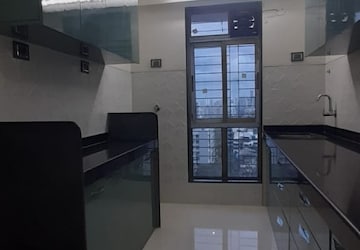 Kitchen in 4 BHK Apartment at Oberoi Realty Park View, Kandivali East – for Sale