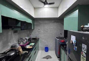 Kitchen in 4 BHK Apartment at Oberoi Realty Park View, Kandivali East – for Sale