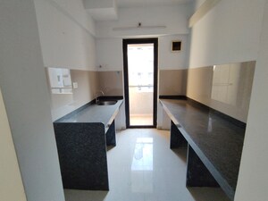 Kitchen in 2 BHK Apartment at Lodha Palava Downtown, Dombivli East – for Rent