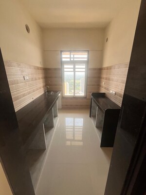 Kitchen in 1.5 BHK Apartment at Sheth Avante, Kanjurmarg West – for Rent