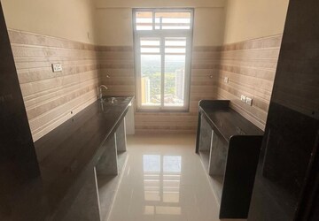 Kitchen in 1.5 BHK Apartment at Sheth Avante, Kanjurmarg West – for Rent