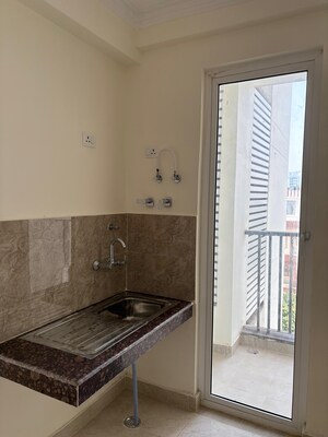 Kitchen in 2.5 BHK Apartment at Eldeco Twin Towers, Iim Road – for Sale