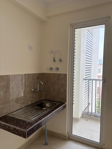 Kitchen in 2.5 BHK Apartment at Eldeco Twin Towers, Iim Road – for Sale