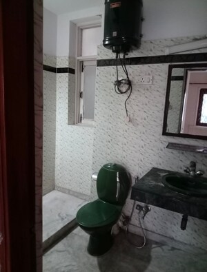 Bathroom in 3 BHK Builder Floor at Greater Kailash I – for Rent