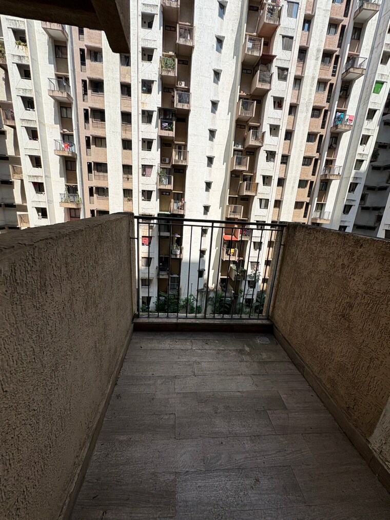 Balcony, lodha-lakeshore-greens 2 Bedroom 630 Sq.Ft. Apartment In Hedutane Thane 9355950