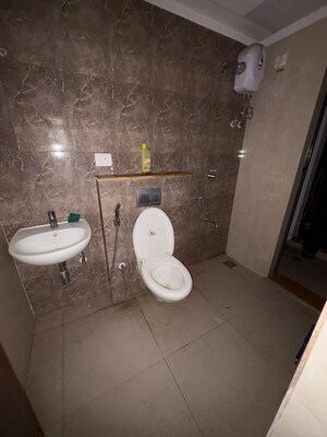 Bathroom in 1 BHK Apartment at Lodha Palava Downtown, Taloja Bypass Road – for Rent
