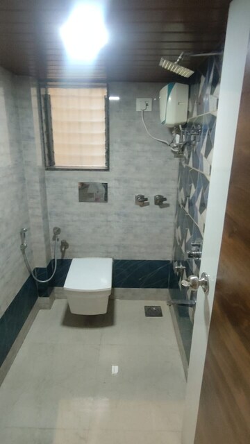 Bathroom in 2 BHK Apartment at Naupada – for Rent