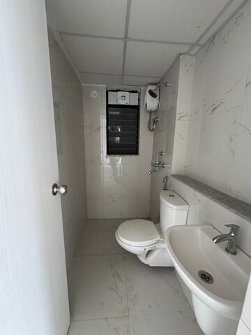 Bathroom in 2 BHK Apartment at Runwal Gardens Phase 4, Kalyan Shilphata Road – for Sale