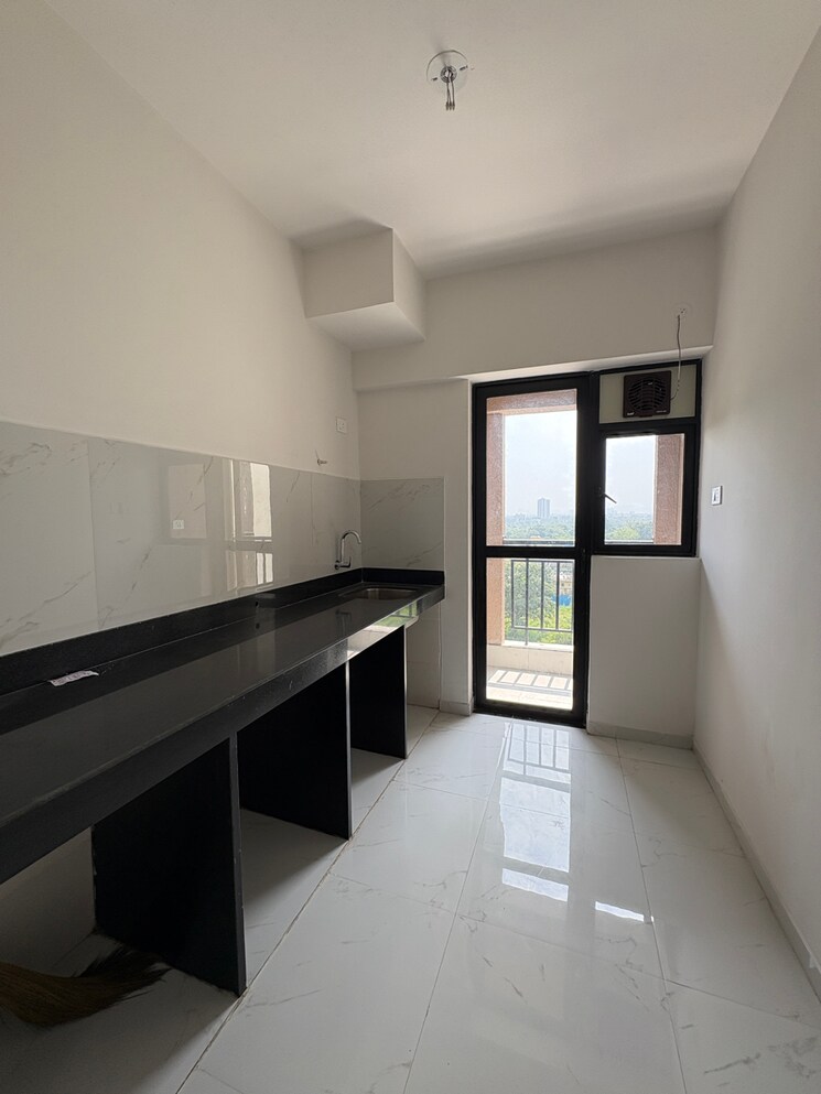 Kitchen, runwal-gardens-phase-3 2 Bedroom 612 Sq.Ft. Apartment In Kalyan Shilphata Road Thane 9355988