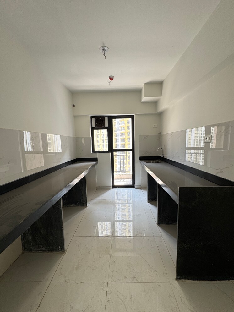 Kitchen, runwal-gardens-north-avenue 3 Bedroom 904 Sq.Ft. Apartment In Ghariwali N V Thane 9356018