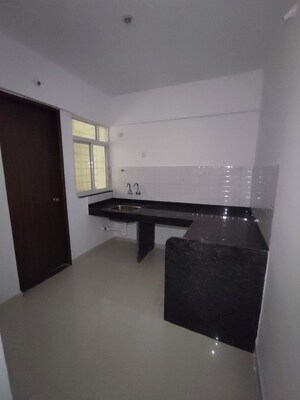 Kitchen in 2 BHK Apartment at Majestique Manhattan Phase 2, Wagholi – for Rent