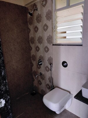 Bathroom in 2 BHK Apartment at Majestique Manhattan Phase 2, Wagholi – for Rent