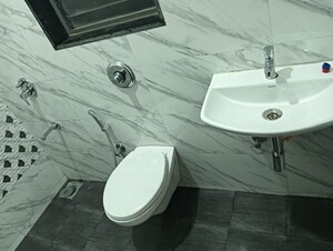 Bathroom in 2 BHK Apartment at Adityaraj Royale, Tagore Nagar – for Rent