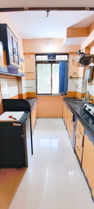 Kitchen in 2 BHK Apartment at Lodha Paradise, Majiwada – for Rent