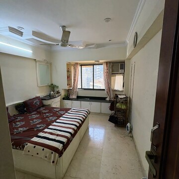 Bedroom in 2 BHK Apartment at Landmark Building Bandra West, Carter Road – for Rent